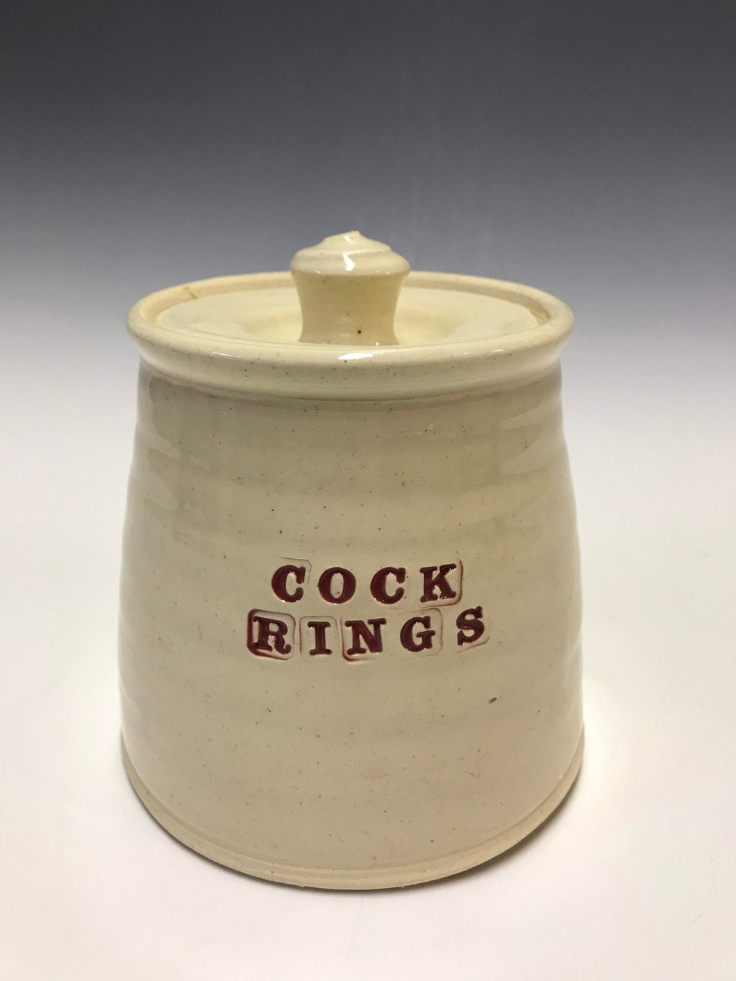 Cock ring jar to hold those embarrassing items on your bathroom vanity.