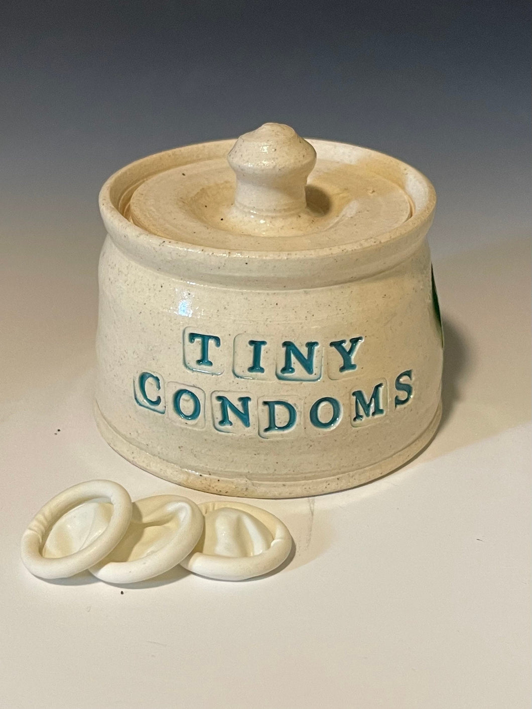 Tiny condoms jar to hold your finger cots, or tiny condoms.